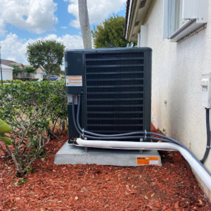 New outdoor AC installation next to a house